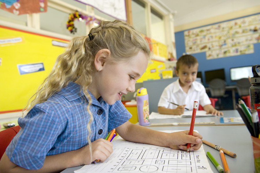 Young girl writing